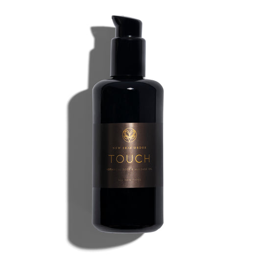 "Ontdek Touch, de ultieme body- en massageolie voor alle huidtypes. Hydrateert,  biedt ontspanning en verwennerij. Geschikt voor verzorging en massages.